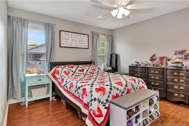 1501 E 6th St, Lumberton, NC 28358 - bedroom with wood finished floors and ceiling fan