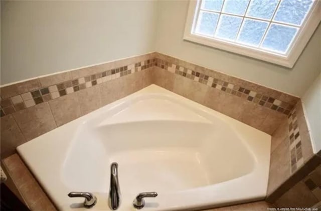 bathroom featuring a bath