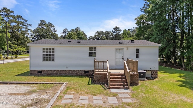 4870 Dogwood Dr, Battleboro, NC 27809 - back of house with crawl space, a yard, a wooden deck, and central AC