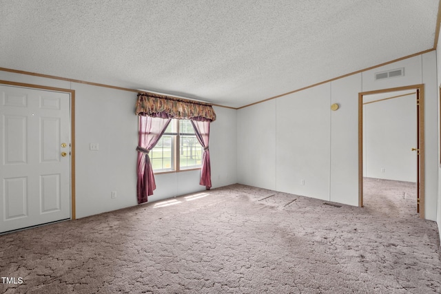 4870 Dogwood Dr, Battleboro, NC 27809 - unfurnished room featuring ornamental molding, carpet, and a textured ceiling