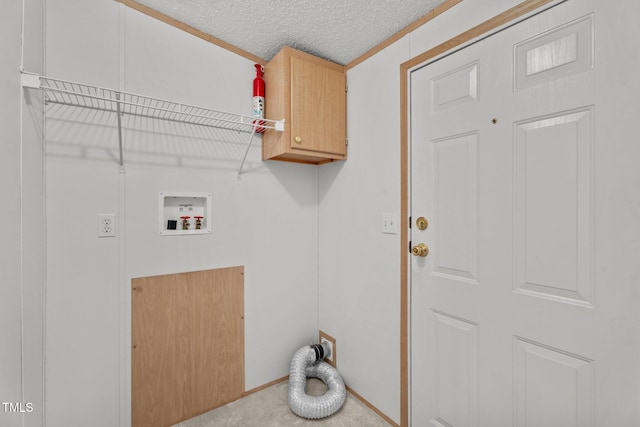 4870 Dogwood Dr, Battleboro, NC 27809 - laundry room with cabinet space, hookup for a washing machine, and a textured ceiling