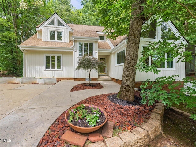 310 Heidinger Dr, Cary, NC 27511 - view of front of property featuring a shingled roof and crawl space