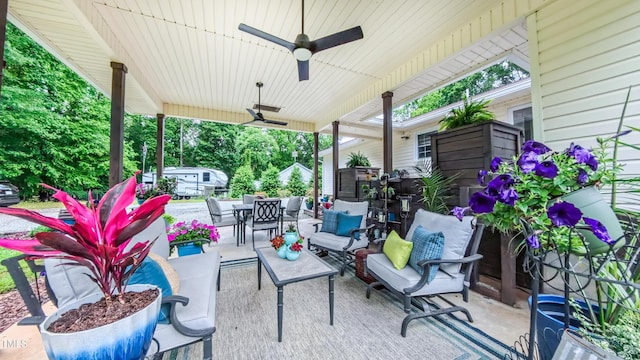 view of patio / terrace with a ceiling fan, outdoor lounge area, and outdoor dining area