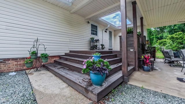 wooden deck featuring a patio area