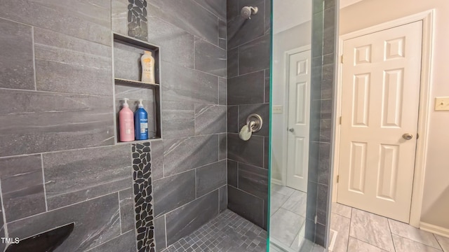 bathroom with a shower stall