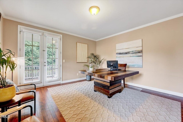 home office with ornamental molding, baseboards, and wood finished floors