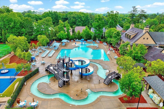 community pool with a patio
