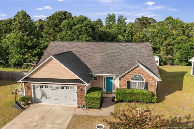 1624 Citation Ct, Parkton, NC 28371 - view of front of property with a garage, driveway, a front lawn, and roof with shingles