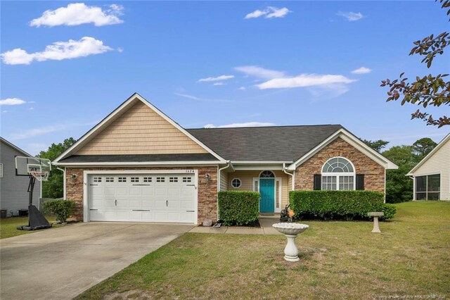 1624 Citation Ct, Parkton, NC 28371 - view of front of house featuring a garage, a front yard, driveway, stone siding, and roof with shingles