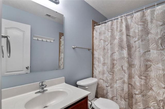 1624 Citation Ct, Parkton, NC 28371 - full bath with vanity, a textured ceiling, and a shower with shower curtain