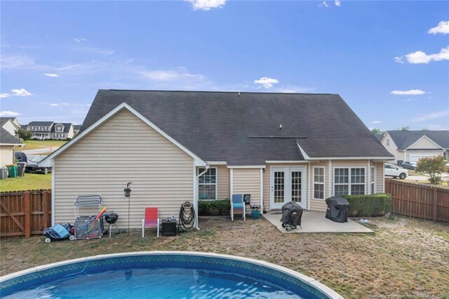 1624 Citation Ct, Parkton, NC 28371 - rear view of property featuring a patio area and a fenced backyard