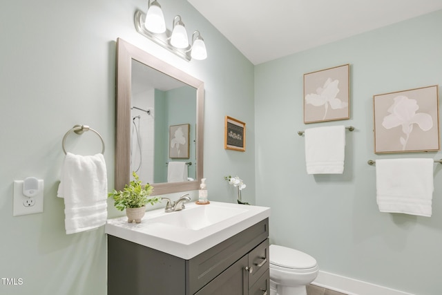 full bathroom featuring toilet and vanity