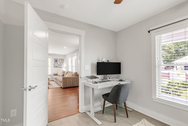 office space featuring baseboards, ceiling fan, and recessed lighting