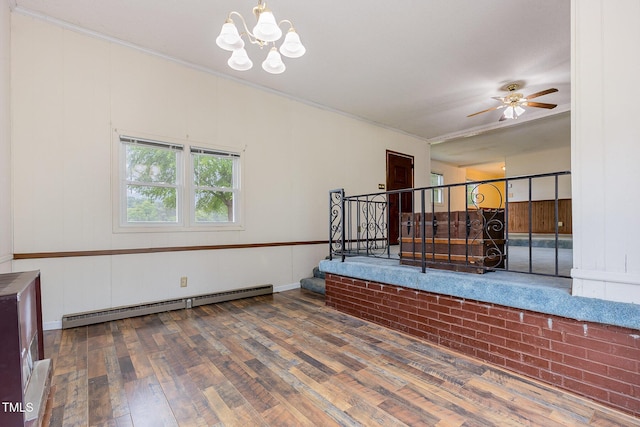 living area featuring a baseboard radiator, hardwood / wood-style flooring, stairs, a chandelier, and ornamental molding