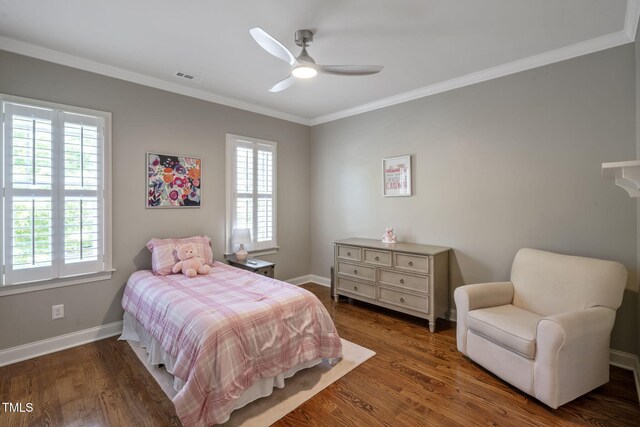 117 Synandra Ln, Holly Springs, NC 27540 - bedroom featuring ornamental molding, wood finished floors, baseboards, and a ceiling fan