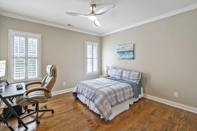 117 Synandra Ln, Holly Springs, NC 27540 - bedroom featuring crown molding, baseboards, a desk, wood finished floors, and ceiling fan