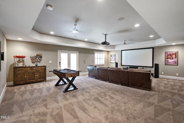117 Synandra Ln, Holly Springs, NC 27540 - home theater room with a tray ceiling, light carpet, recessed lighting, baseboards, and a ceiling fan