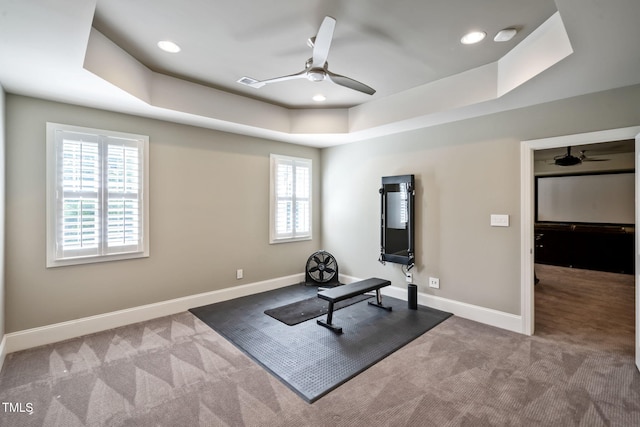 117 Synandra Ln, Holly Springs, NC 27540 - exercise room with a ceiling fan, carpet floors, a tray ceiling, baseboards, and recessed lighting