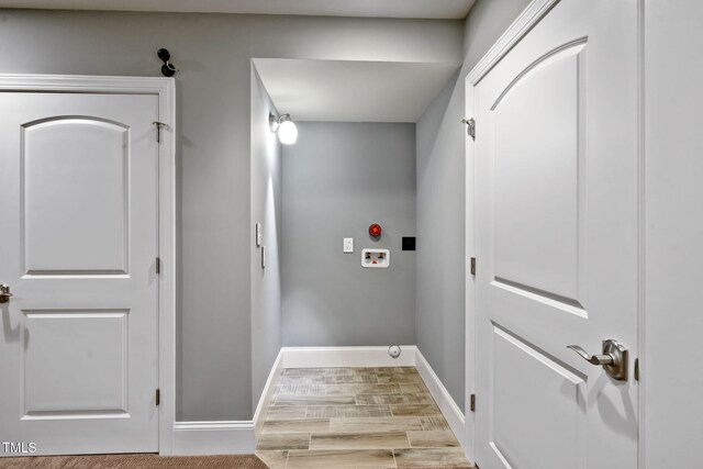 117 Synandra Ln, Holly Springs, NC 27540 - laundry room featuring hookup for a washing machine, baseboards, and wood finished floors