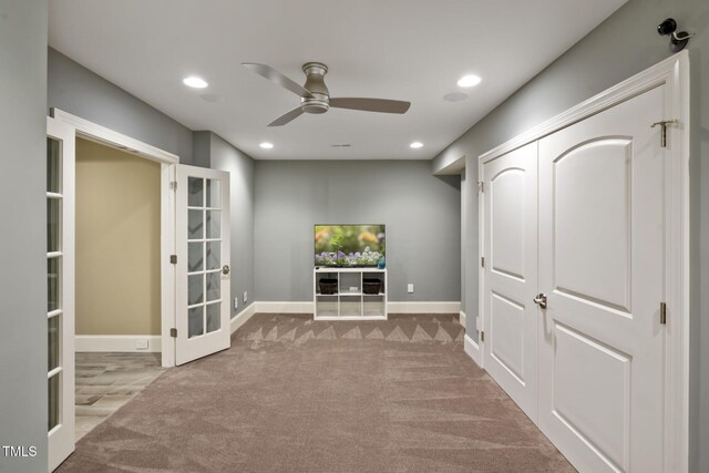 117 Synandra Ln, Holly Springs, NC 27540 - carpeted spare room featuring french doors, ceiling fan, recessed lighting, and baseboards