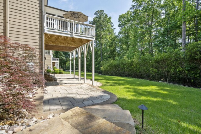 117 Synandra Ln, Holly Springs, NC 27540 - view of yard featuring a patio area
