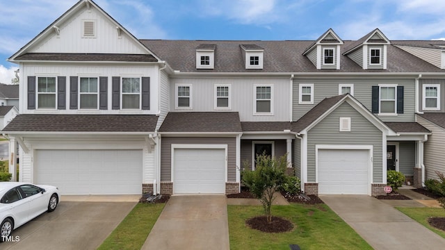 19 Willow Green Dr, Clayton, NC 27527 - view of property with an attached garage, a shingled roof, driveway, and board and batten siding