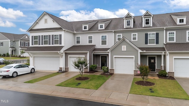 19 Willow Green Dr, Clayton, NC 27527 - townhome / multi-family property with roof with shingles, an attached garage, and driveway