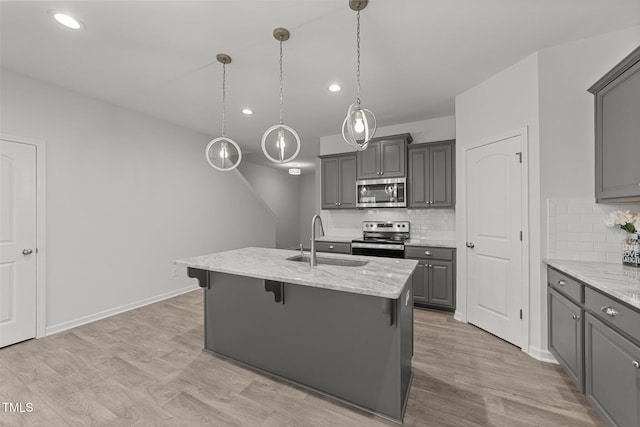 19 Willow Green Dr, Clayton, NC 27527 - kitchen featuring a sink, appliances with stainless steel finishes, gray cabinets, backsplash, and recessed lighting