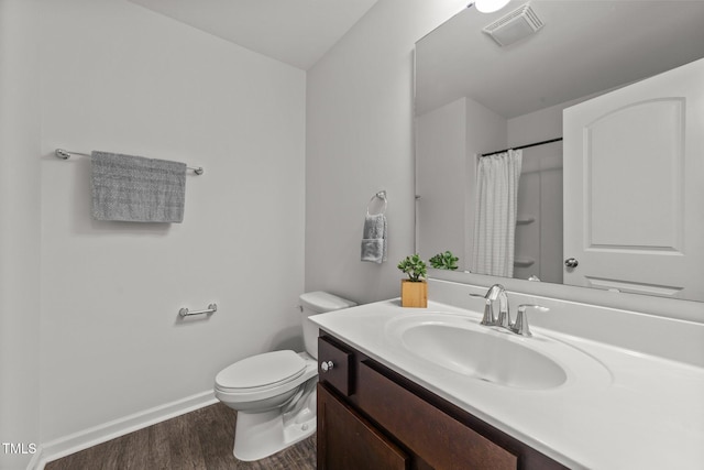 19 Willow Green Dr, Clayton, NC 27527 - full bath featuring wood finished floors, toilet, baseboards, vanity, and a shower with curtain