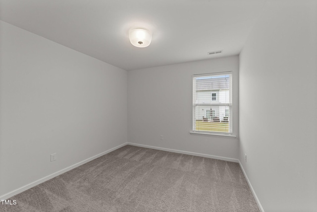 19 Willow Green Dr, Clayton, NC 27527 - spare room featuring light colored carpet and baseboards