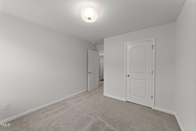19 Willow Green Dr, Clayton, NC 27527 - unfurnished bedroom featuring carpet and baseboards