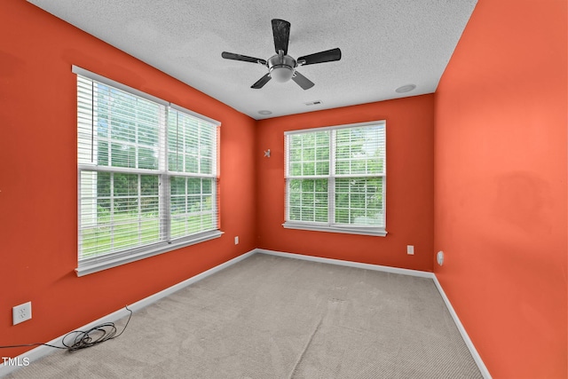 3705 Rivermist Dr, Raleigh, NC 27610 - carpeted spare room with baseboards, a textured ceiling, and ceiling fan