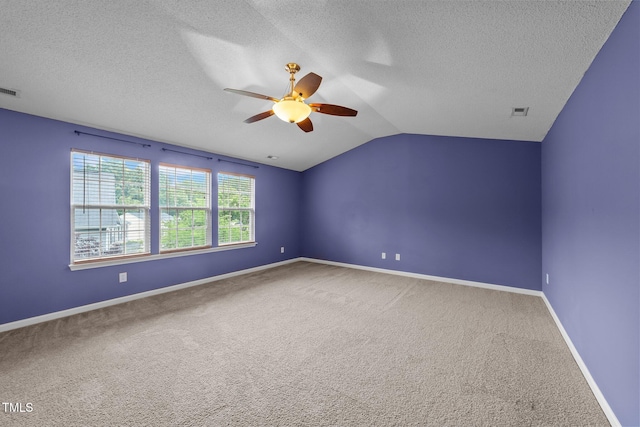 3705 Rivermist Dr, Raleigh, NC 27610 - additional living space with ceiling fan, carpet flooring, a textured ceiling, lofted ceiling, and baseboards