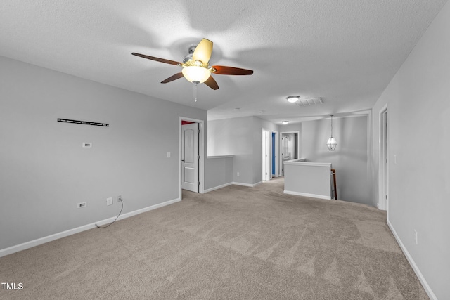 3705 Rivermist Dr, Raleigh, NC 27610 - unfurnished room featuring ceiling fan, light carpet, a textured ceiling, and baseboards