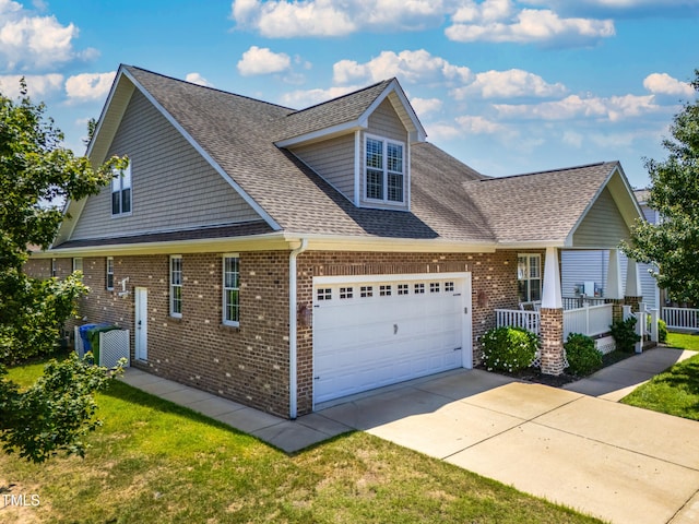 1218 Crystalwater Dr, Fuquay Varina, NC 27526 - view of front of property with a garage, brick siding, a shingled roof, and driveway