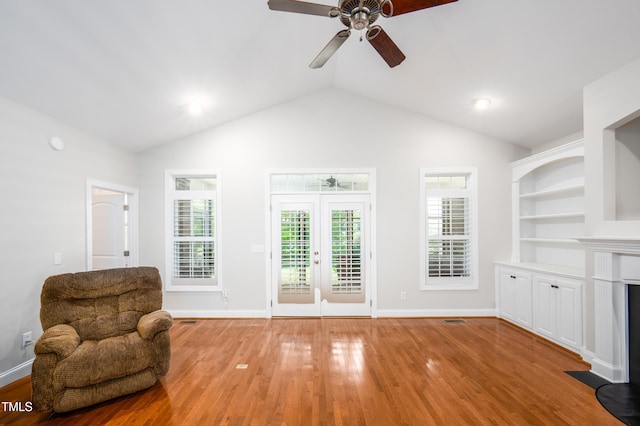 1218 Crystalwater Dr, Fuquay Varina, NC 27526 - sitting room featuring light wood-style floors, a ceiling fan, lofted ceiling, and baseboards