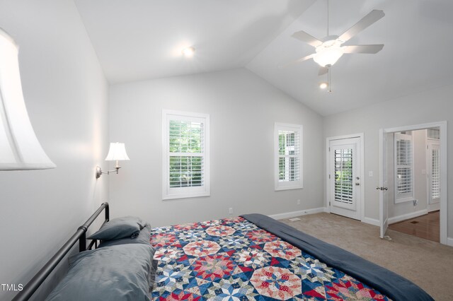 1218 Crystalwater Dr, Fuquay Varina, NC 27526 - carpeted bedroom featuring access to exterior, multiple windows, lofted ceiling, baseboards, and ceiling fan