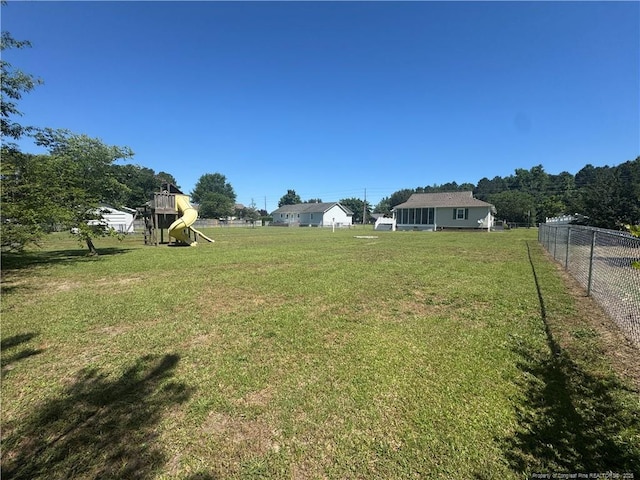 303 Nash Rd, Saint Pauls, NC 28384 - view of yard featuring a playground