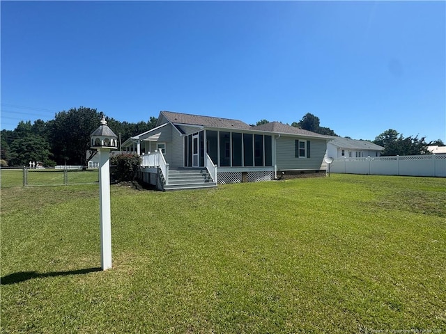 303 Nash Rd, Saint Pauls, NC 28384 - rear view of property with a sunroom and crawl space
