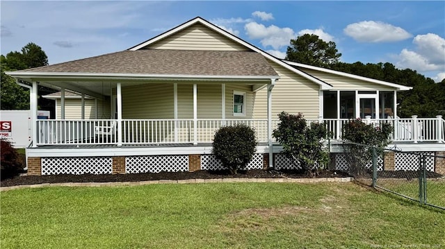 303 Nash Rd, Saint Pauls, NC 28384 - rear view of property with a shingled roof, covered porch, and a sunroom