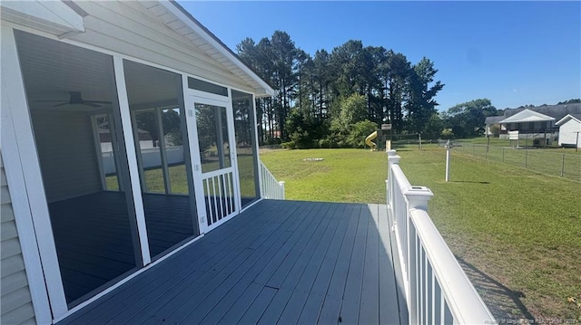 303 Nash Rd, Saint Pauls, NC 28384 - wooden terrace featuring a sunroom and a yard