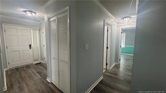 303 Nash Rd, Saint Pauls, NC 28384 - hallway featuring a textured ceiling, dark wood-style flooring, baseboards, and ornamental molding
