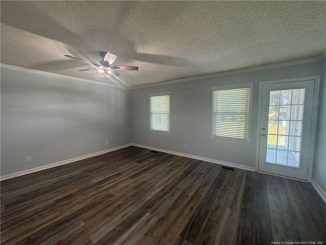 303 Nash Rd, Saint Pauls, NC 28384 - empty room featuring a ceiling fan, dark wood-style floors, a textured ceiling, crown molding, and baseboards