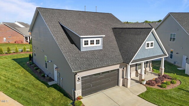 2096 Dowell Ct, Burlington, NC 27215 - view of front of property with driveway, a shingled roof, and a front lawn
