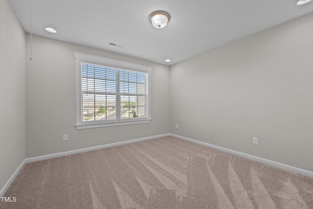 2096 Dowell Ct, Burlington, NC 27215 - carpeted empty room featuring baseboards and recessed lighting