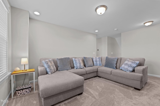 2096 Dowell Ct, Burlington, NC 27215 - carpeted living area with baseboards, plenty of natural light, and recessed lighting