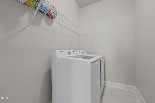 2096 Dowell Ct, Burlington, NC 27215 - laundry area with washer and clothes dryer, light marble finish flooring, and baseboards
