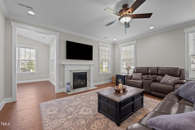 2096 Dowell Ct, Burlington, NC 27215 - living room with a ceiling fan, light wood-type flooring, baseboards, a fireplace, and crown molding
