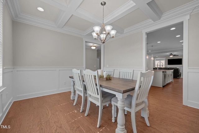 2096 Dowell Ct, Burlington, NC 27215 - dining space with a chandelier, coffered ceiling, crown molding, beamed ceiling, and wood finished floors