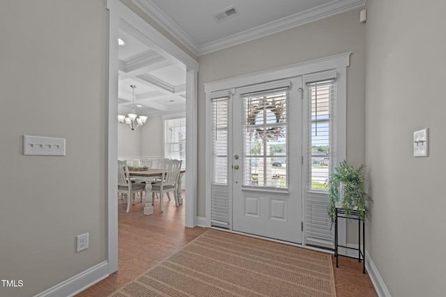2096 Dowell Ct, Burlington, NC 27215 - foyer entrance with ornamental molding, coffered ceiling, a chandelier, wood finished floors, and beamed ceiling
